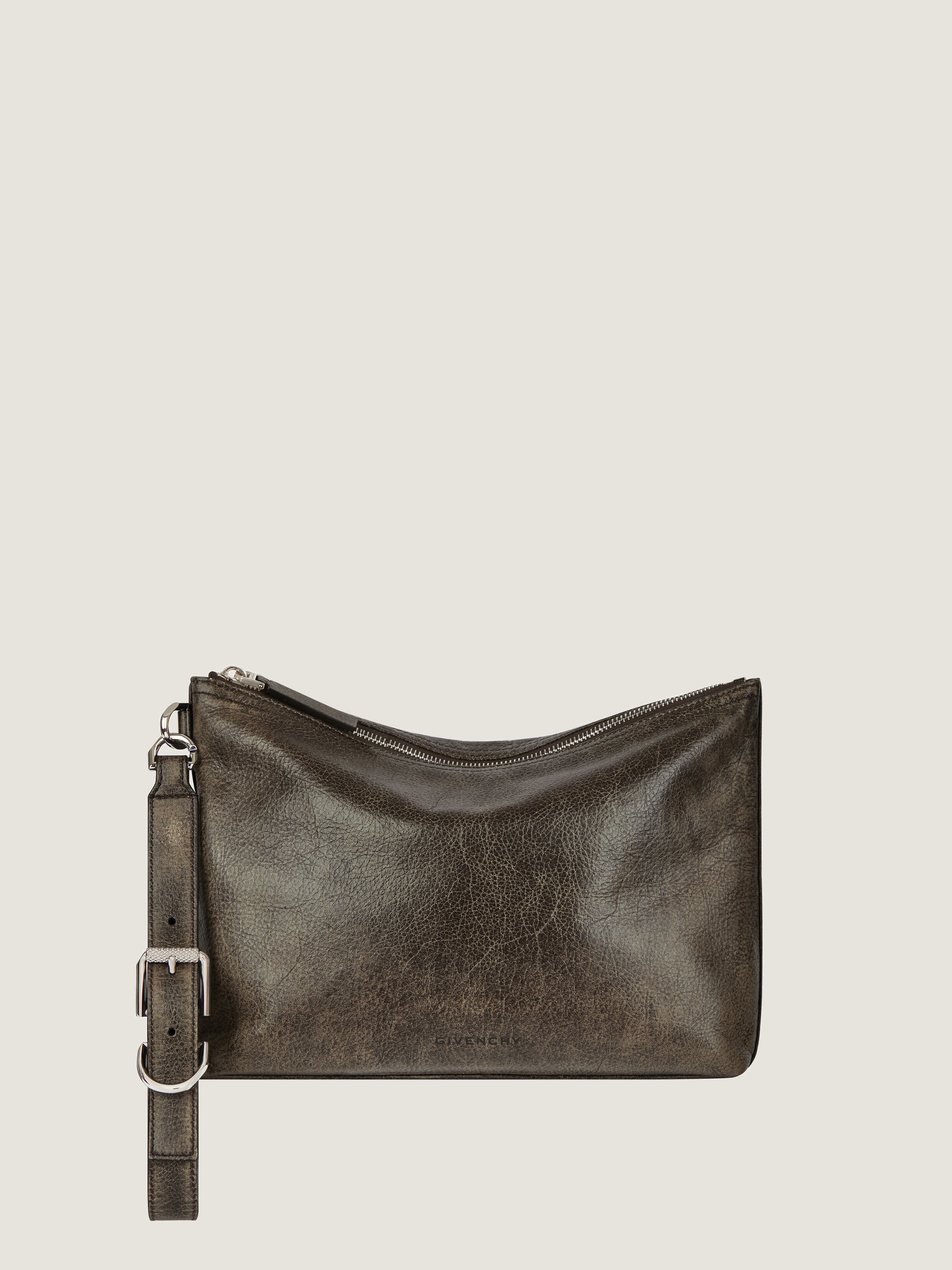 Voyou pouch in aged leather